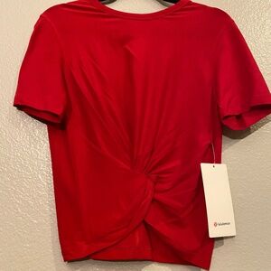 Lululemon crescent t-shirt size 4 in dark red color and new with tags
